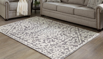 Oddetteley 5'1" x 7'2" Washable Rug