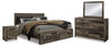 Derekson King Panel Storage Bed, Dresser, Mirror and Nightstand