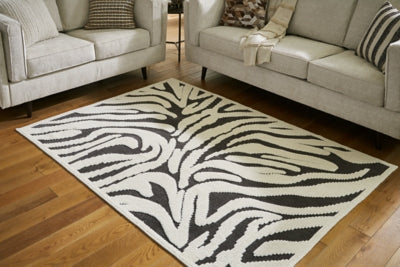 Thomwith 5'1" x 7'2" Washable Rug